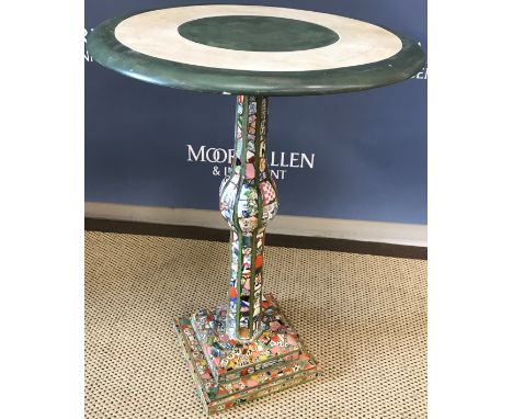 A 20th Century painted and broken china mosaic decorated pedestal occasional table, the circular top on a centre column to st