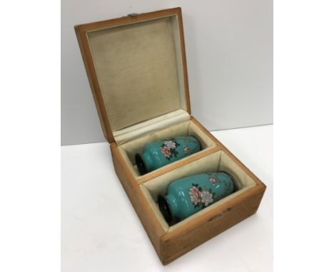 A pair of cloisonné vases of baluster form, each set with rose decoration, 9 cm high, housed in a fitted case CONDITION REPOR