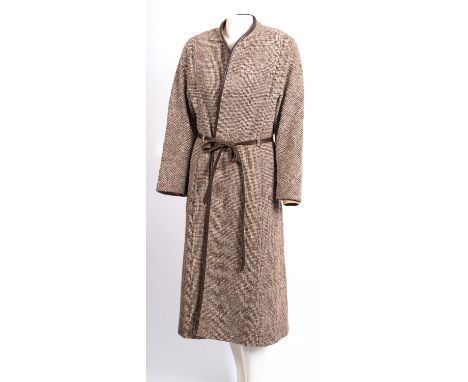 A mid 20th century lady's brown wool tweed overcoat by Aquascutum.
