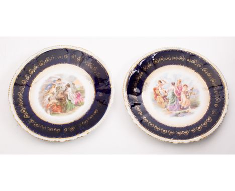 A pair of early Dresden porcelain plates, the centres lithographed with allegorical scenes within blue and gold borders, prin