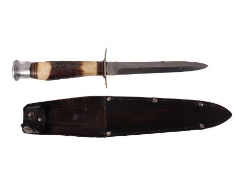 A WWII British Commercial Fighting Knife, maker William Rogers, Sheffield, the straight double edged blade signed to ricasso 