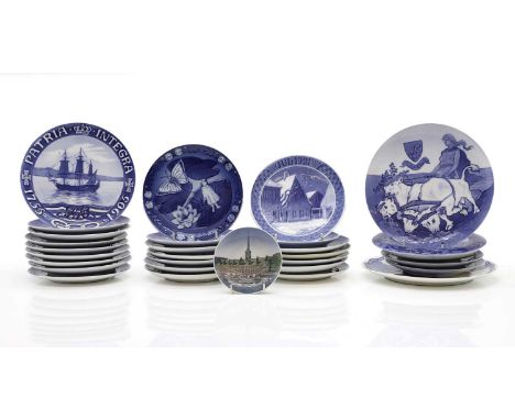 A group of thirty Royal Copenhagen Year and Commemorative plates, 1911 to 1980s, with various sizes, printed and underglaze m