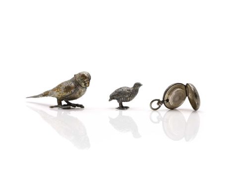 A silver-plated pepperette modelled as a parrot, with hinged cover, 11cm wide,together with a silver-plated partridge,3cm hig