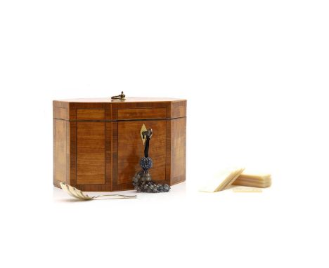 A George III inlaid satinwood tea caddy,  of octagonal form, with an ivory escutcheon, the interior with new foil and paper, 