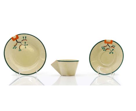 A Clarice Cliff pottery 'Ravel' pattern trio c.1930, comprising a Conical shape teacup 11.5cm wide, a saucer 14.5cm diameter,