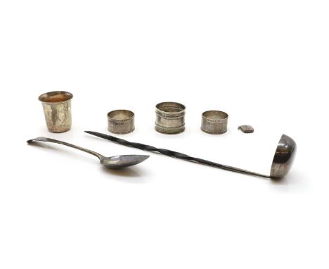 A group of silver items to include a pair of cased silver napkin rings, by Viners Ltd, Sheffield 1937, 4.5cm diameter, a Cont