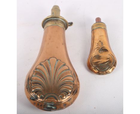 A Dixon & Sons patent 19th Century shell embossed copper powder flask, 8" long, and a similar flask, 4 1/2" long