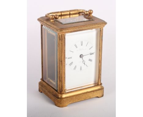 An early 20th Century carriage clock in gilded brass case, white enamel dial inscribed "Boxell the Observatory", 5" high