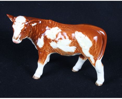 Three Goebel china horses, a rabbit, a heifer and an unmarked horse