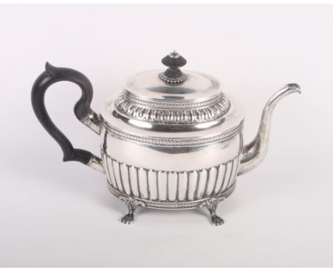 A 19th Century Swedish silver teapot on four claw feet with ebony handle and finial, 15.8oz troy approx