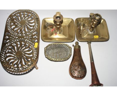 A Dunhill copper and nickel lighter shaped as a hunting horn, a brass watering can, a jug, a planter, a trivet, a tray and ca