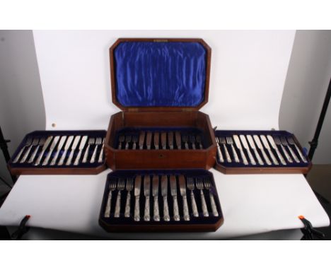 A King's Pattern forty-eight piece silver fish knife and fork set, in walnut case