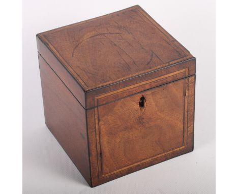 A George III mahogany and line inlaid single compartment tea caddy, 5" wide