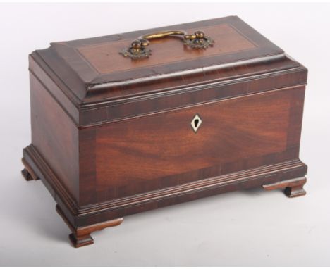 A George II mahogany three-compartment tea caddy on bracket feet, 10 1/2" wide