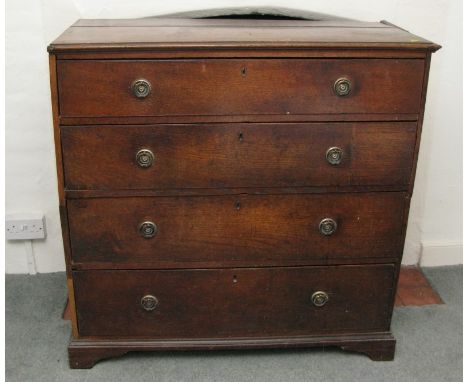 A Georgian provincial oak chest of four long graduated drawers, on bracket supports, 42" wide (cut)