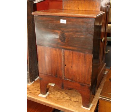 A mahogany side cabinet, fitted lift-up lid over cupboards, on bracket supports, 17" wide