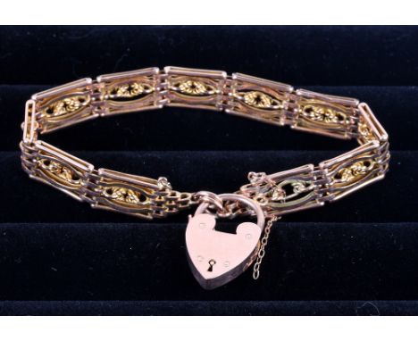 A 9ct gold gate link bracelet with heart-shaped clasp, 20.4g
