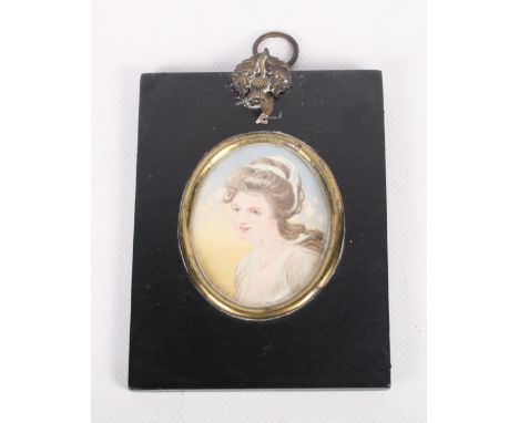 A miniature portrait of Lady Hamilton, 3" x 2 1/2", in ebonised papier-mache frame