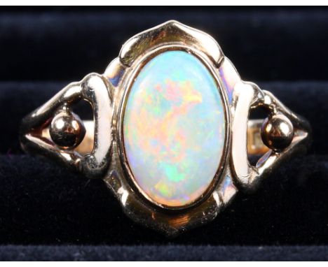 A 9ct gold dress ring set single opal, size R, and a similar 15ct gold bar brooch set opal