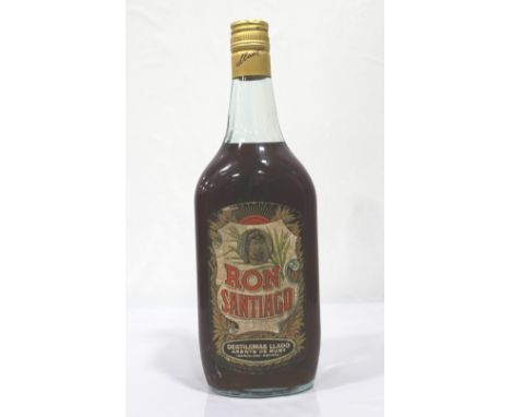 RON SANTIAGO CIRCA 1960We estimate this rare bottle of Ron Santiago as coming from the late 1950's/ early 1960's.  95cl.  47%