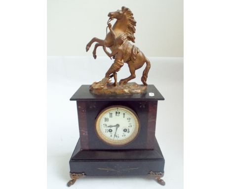 Victorian striking mantel clock in black marble case with gilt metal Marley horse style mount 