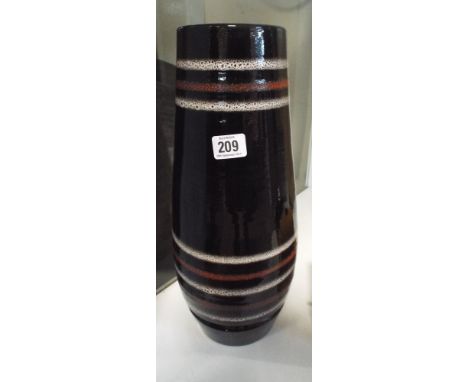 A large Poole Pottery brown ribbed vase 