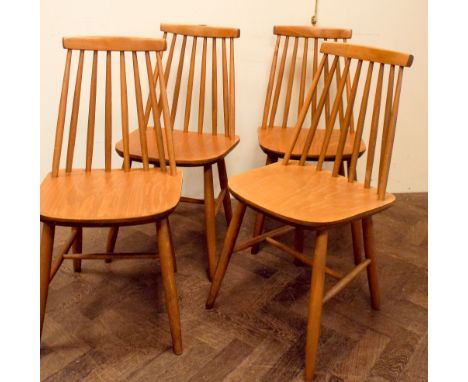 Set of four mid-century stick back dining chairs 