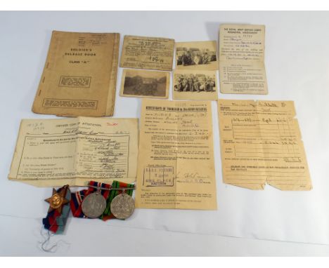 Group of 3 World War II medals to include the 1939/45 star, war and defence medals together with paperwork and photographs al