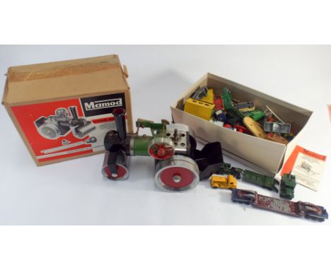 A model Mamod steam traction engine in its original box together with a box full of Dinky toy cars to include steamrollers, t