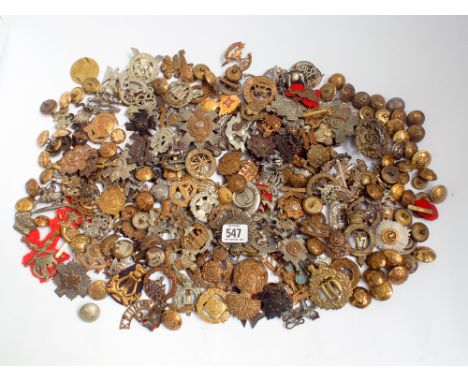 A large lot of British army cap badges, Glengarry and shoulder titles, to include the 'Bedford Regiment, the Worcestershire R