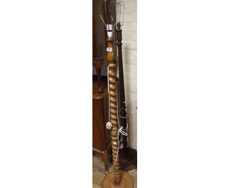 A barley twist column lamp base together with an octagonal base mahogany lamp column