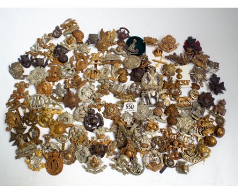 A collection of British army cap badges, collar dogs and shoulder titles etc to include the Somerset Light Infantry, the Roya