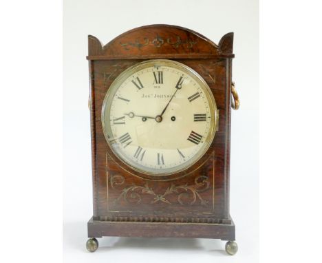 Regency double fusee bracket clock in brass inlaid rosewood case with 8" circular enamel dial by Josh Johnson. 17.5" high, 11