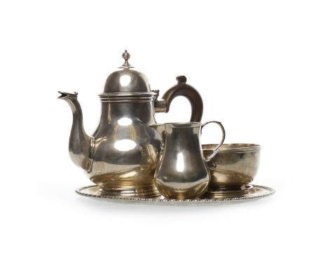 GEORGE V SILVER TEA SERVICEcomprising teapot, sugar and cream jug, maker C S Harris & Sons. Ltd, London 1919-21, the teapot o