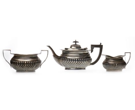 EDWARD VII THREE PIECE SILVER TEA SERVICEmaker William Aitken, Birmingham 1904-1906, comprising tea pot, milk jug and sugar b