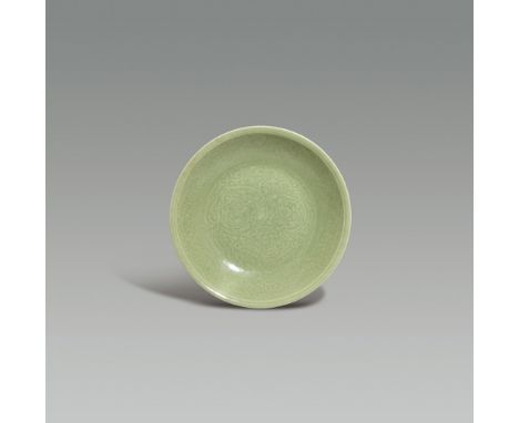 KANGXI CELADON PLATE KANGXI CELADON PLATEFrom a British private collection 30.5 cm. (D) 5.6 cm. (H)