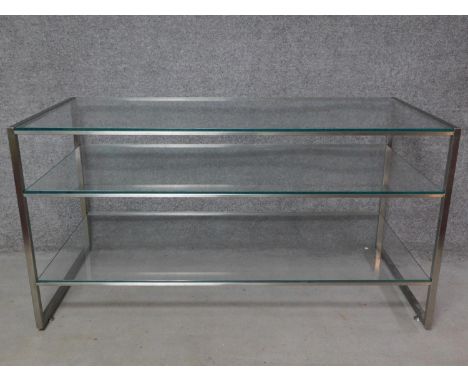 A vintage chrome framed three tier display counter with plate glass shelves. H.82 W.156 D.73cm 