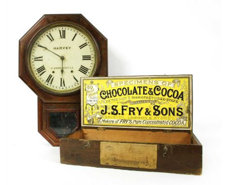 A late 19th century walnut drop dial clock , inscribed 'harvey Camberwell', together with a JS Fry &amp; Sons chocolate ox wi