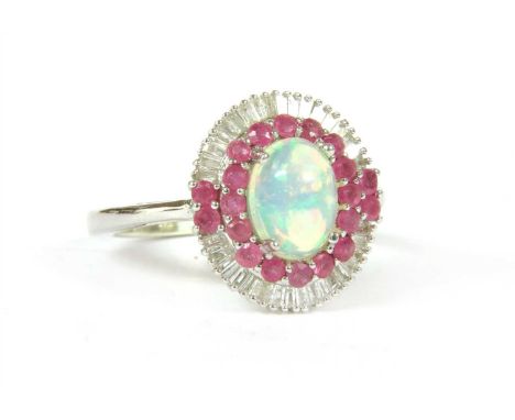 A white gold opal, ruby and diamond oval cluster ring, marked 9k, finger size L, 3.38g