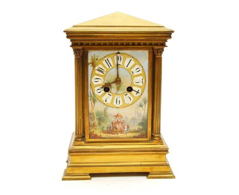 A late 19th century French brass mantel clock, with three enamelled panels of Indian scenes depicting figures beside an eleph