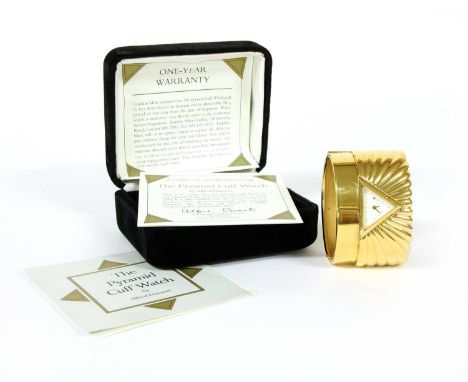 A ladies gold plated pyramid cuff style bangle watch, by Alfred Durante for the Franklin Mint, with box and papers, a silver 