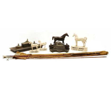 A bronzed inkstand modelled as horse, together with a similar classical example, three graduating Scotch Whisky white horses,