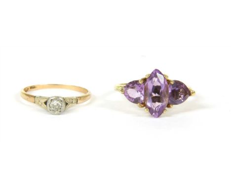 A single stone diamond ring, marked 18 PLAT, and a three stone amethyst ring, marked 10k, 1.21g, 2.96g, finger size J (amethy