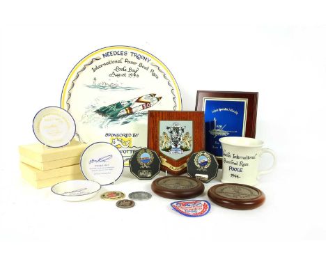 A collection of power boat racing memorabilia , including a needles trophy in the form of a Poole pottery charger