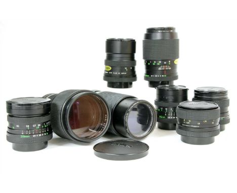 A collection of eight camera lenses, to include a Zoom-Rolleinar MC 80-200mm f/1.4, a Voigtlander Color-Ultron 55mm f/1.4, a 