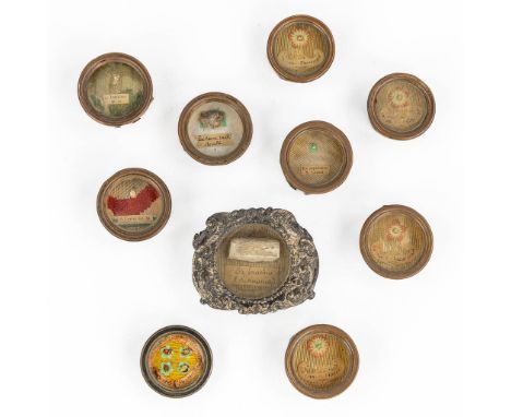 10 sealed theca with various relics.- Saint Clara, Martyr: Ex ossibus Sancta Clara Martyris- Saint Rogati, Martyr: Ex ossibus