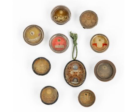 10 sealed theca with various relics.- Saint Appolonia Virgin &amp; Martyr: Ex ossibus Sancta Appolonia Virginis &amp; Martyri