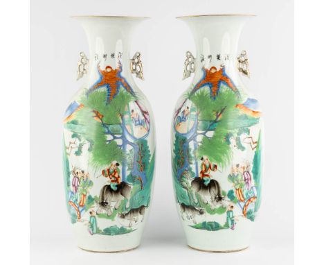 A pair of Chinese vases, decorated with playing children and kaligraphic texts.Condition report: - One of the vases with a sm