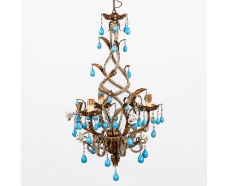 A vintage twisted brass chandelier decorated with light blue glass, circa 1940.Finished with small porcelain roses.Dimensions