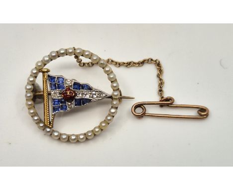 A yellow metal, diamond, sapphire and seed pearl "Royal Thames Yacht Club" Burgee brooch, having red enamel crown to centre, 